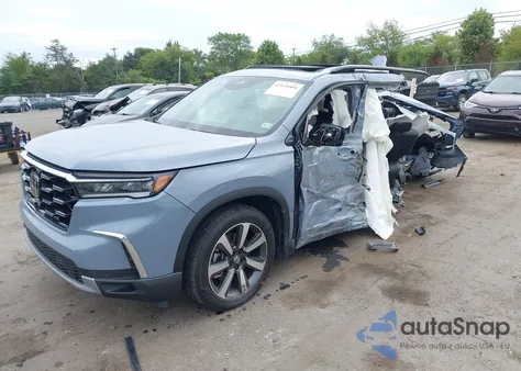 2025 Honda Pilot Touring from USA, damaged, VIN 5FNYG1H71SB082458